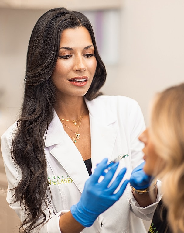 Medical professional consulting patient in clinic.